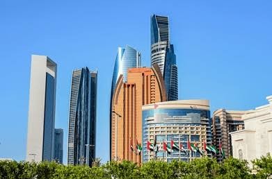 Modern residential high-rise towers in Abu Dhabi requiring building move permits.