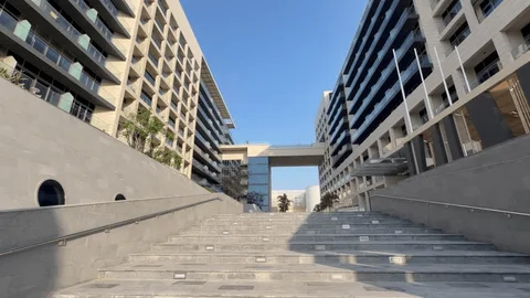 Keywords-focused: Abu Dhabi residential apartment building exterior for moving and downsizing guide.
