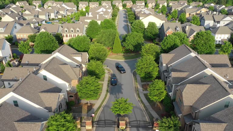 Aerial view of a gated residential community neighborhood in Abu Dhabi.